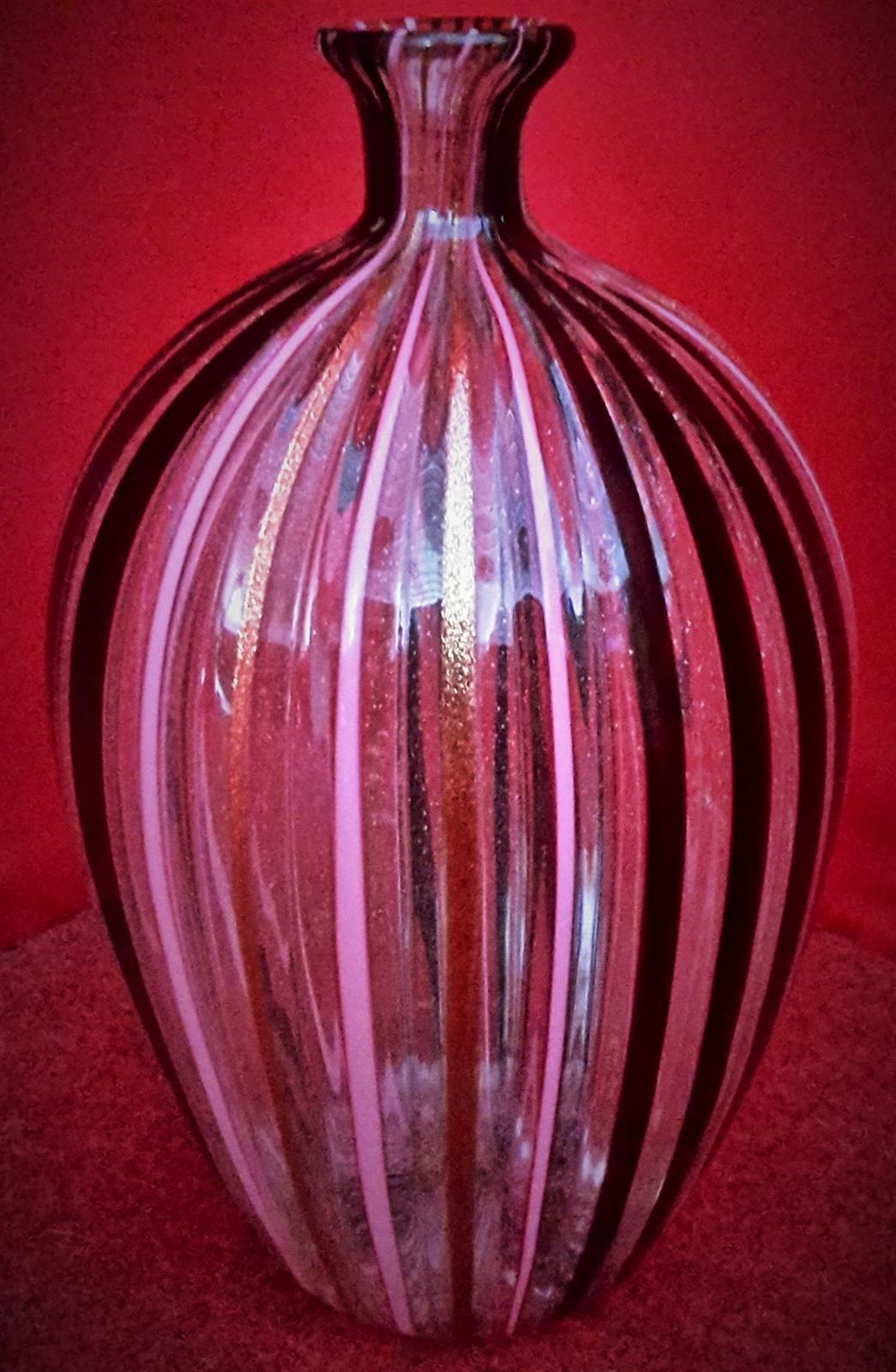 Blown glass bottle with cap