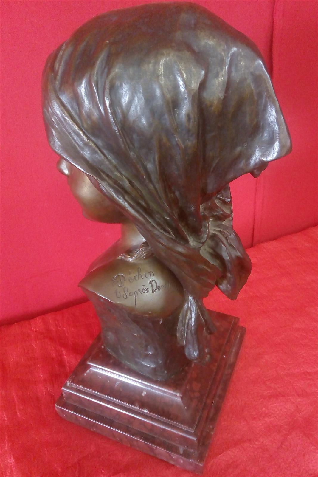 Smiling girl's face Bronze signed
