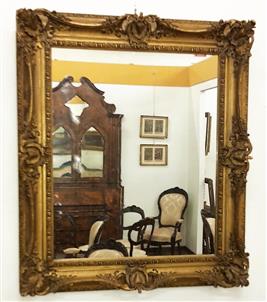 Mirror in gilded plaster restored