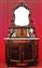 Credenza lombarda intagliata con alzata a specchi