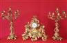 Clock and Pair of gilt bronze candlesticks