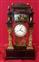 Pendulum clock in gilded and lacquered wood