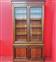 Walnut bookcase with black frames