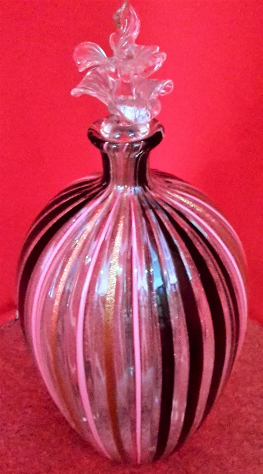 Blown glass bottle with cap
