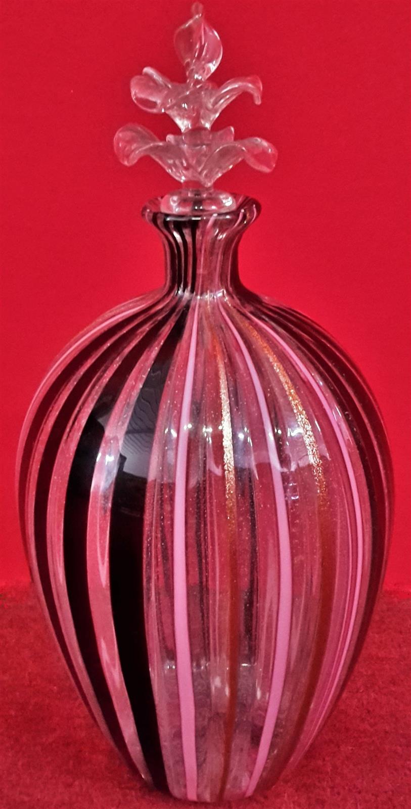 Blown glass bottle with cap