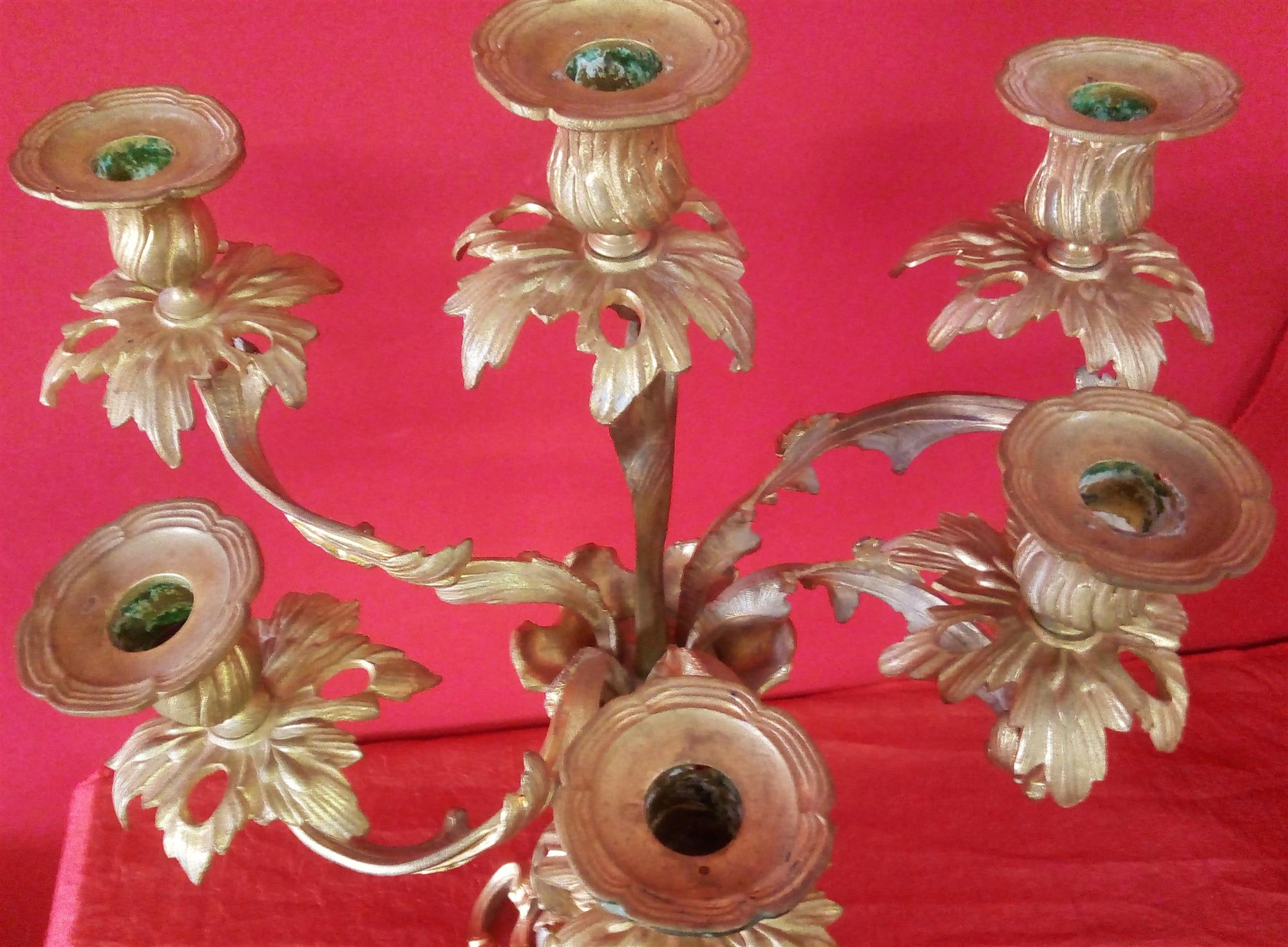 Clock and Pair of gilt bronze candlesticks