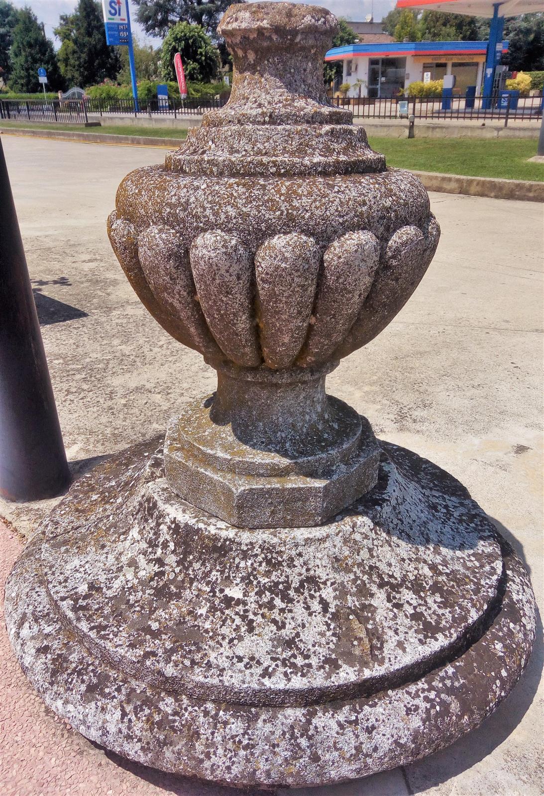 Pair of capitals with round base