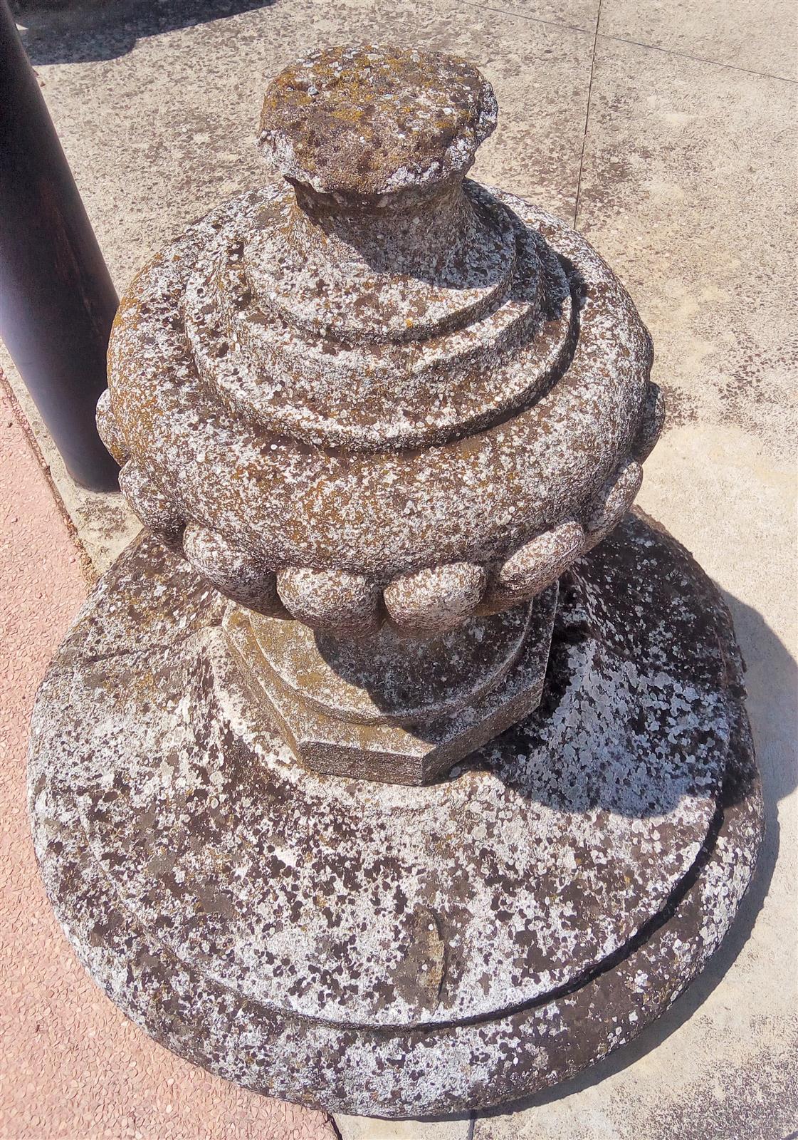 Pair of capitals with round base