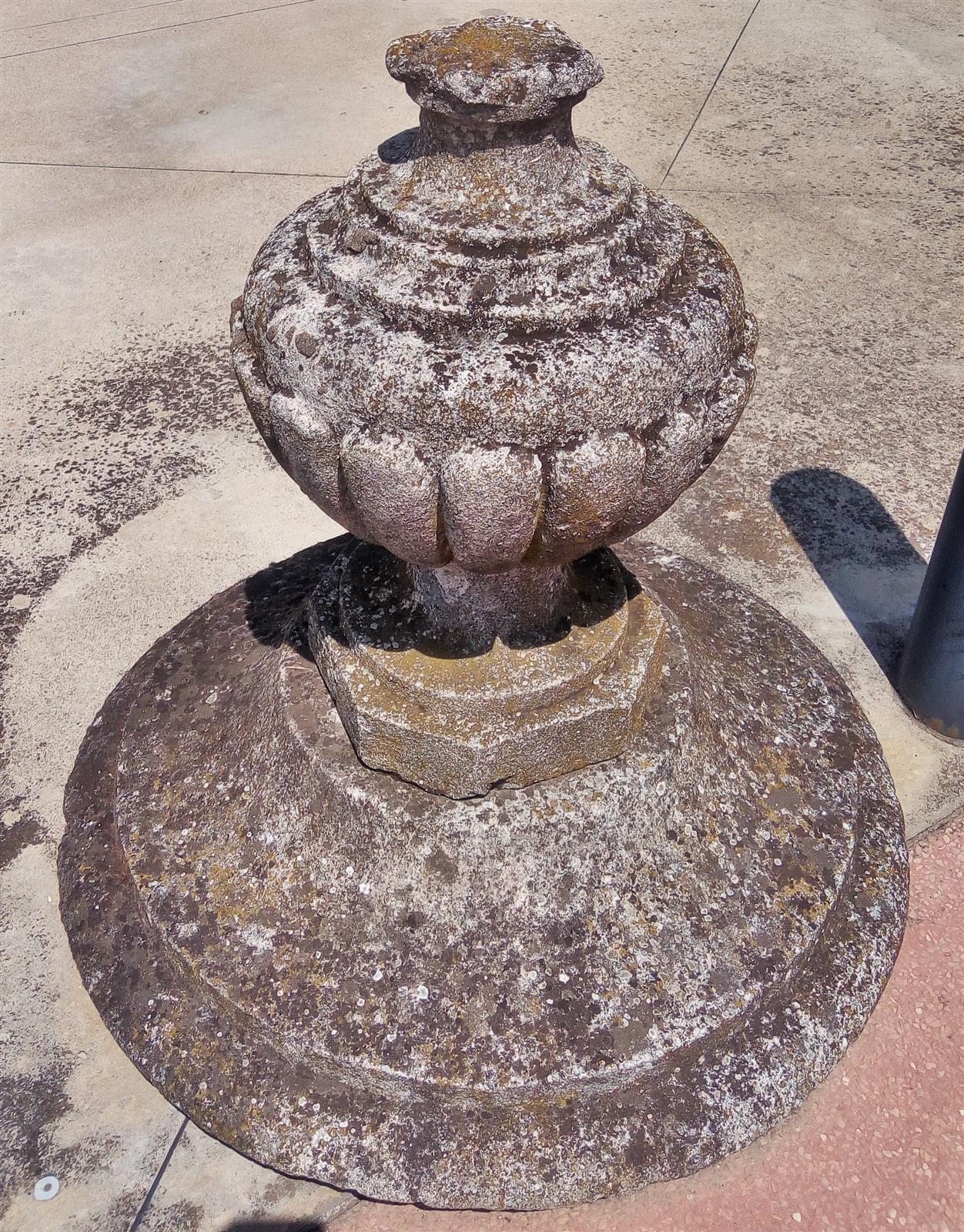 Pair of capitals with round base