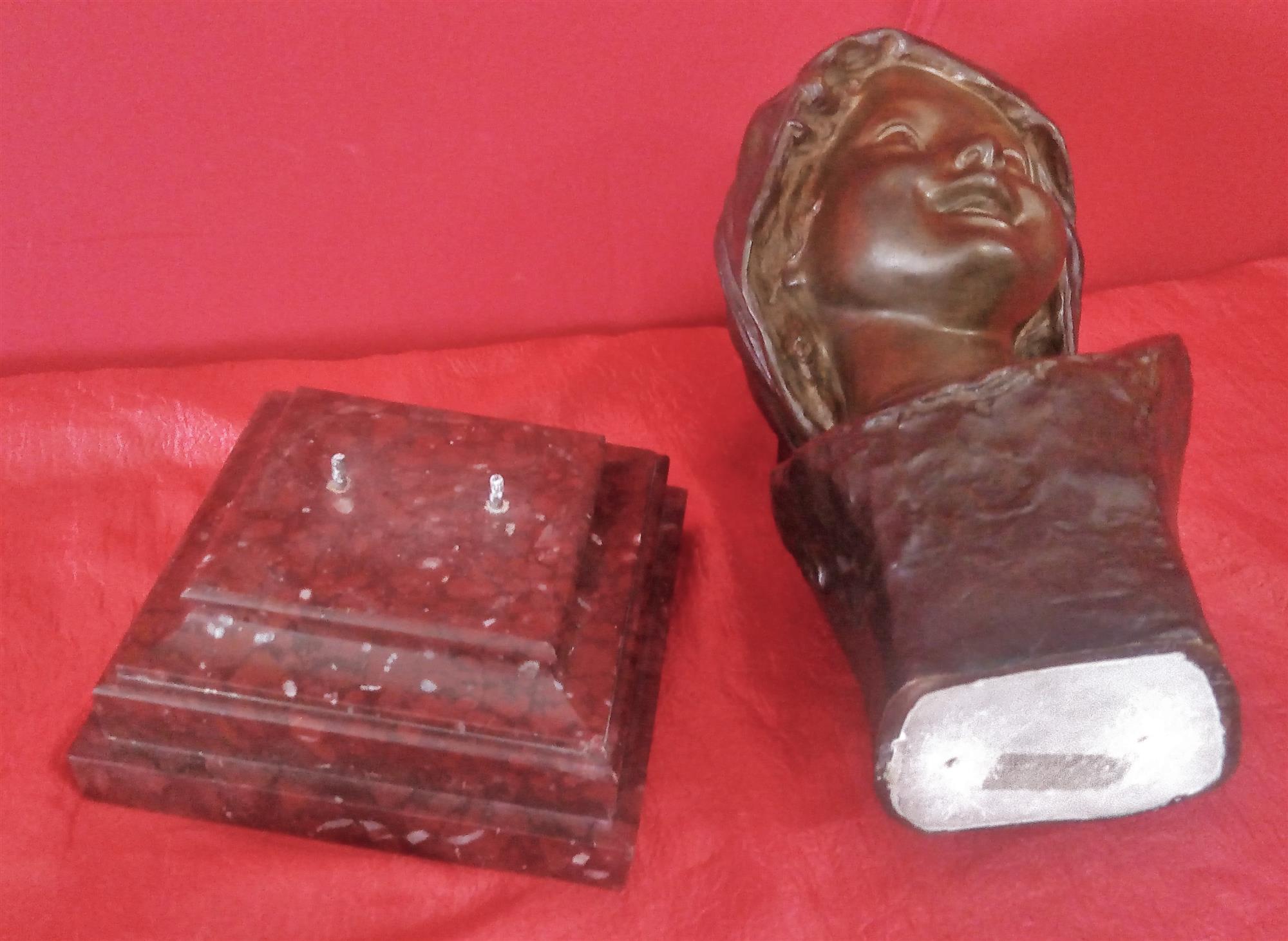 Smiling girl's face Bronze signed