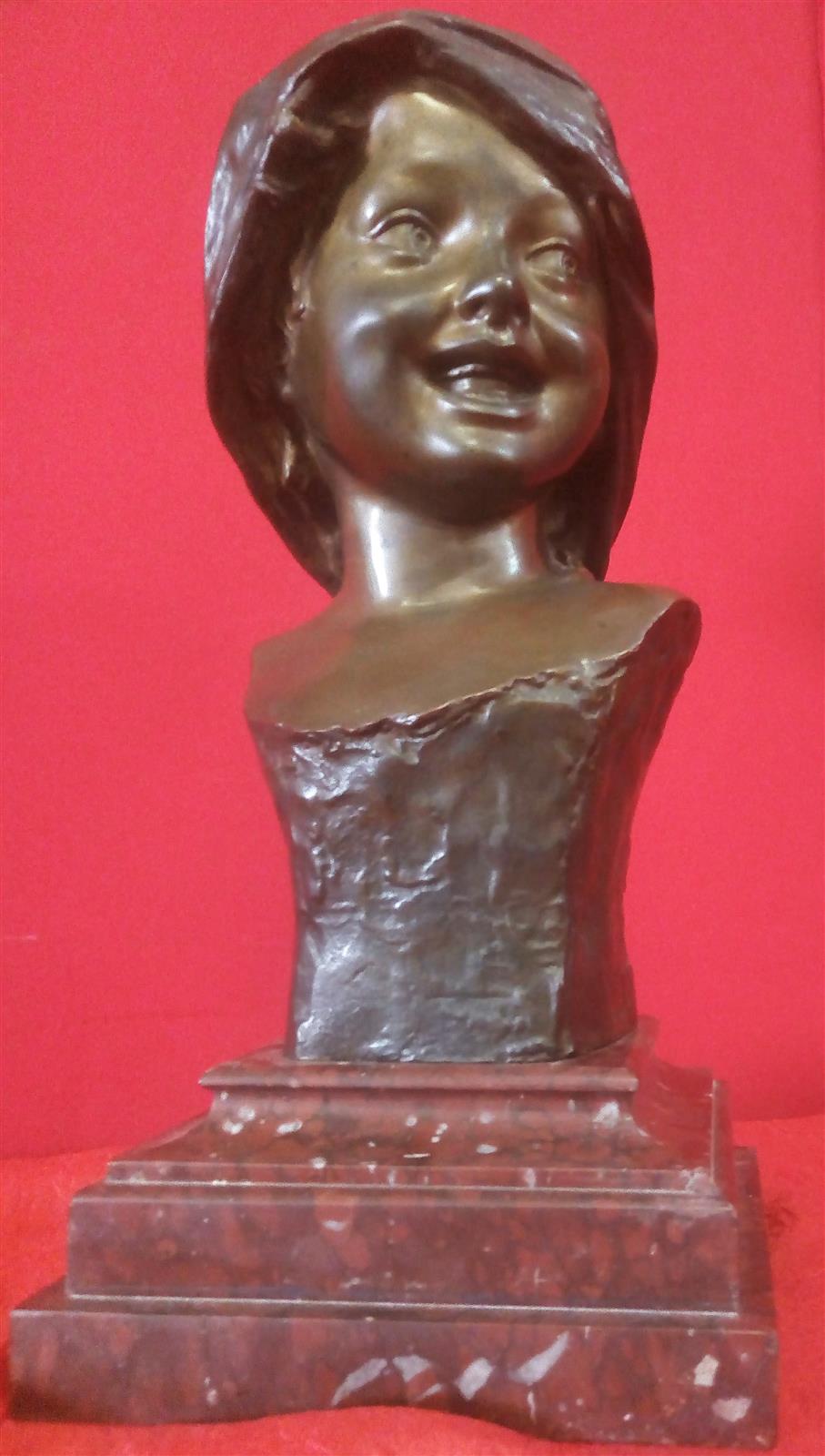 Smiling girl's face Bronze signed