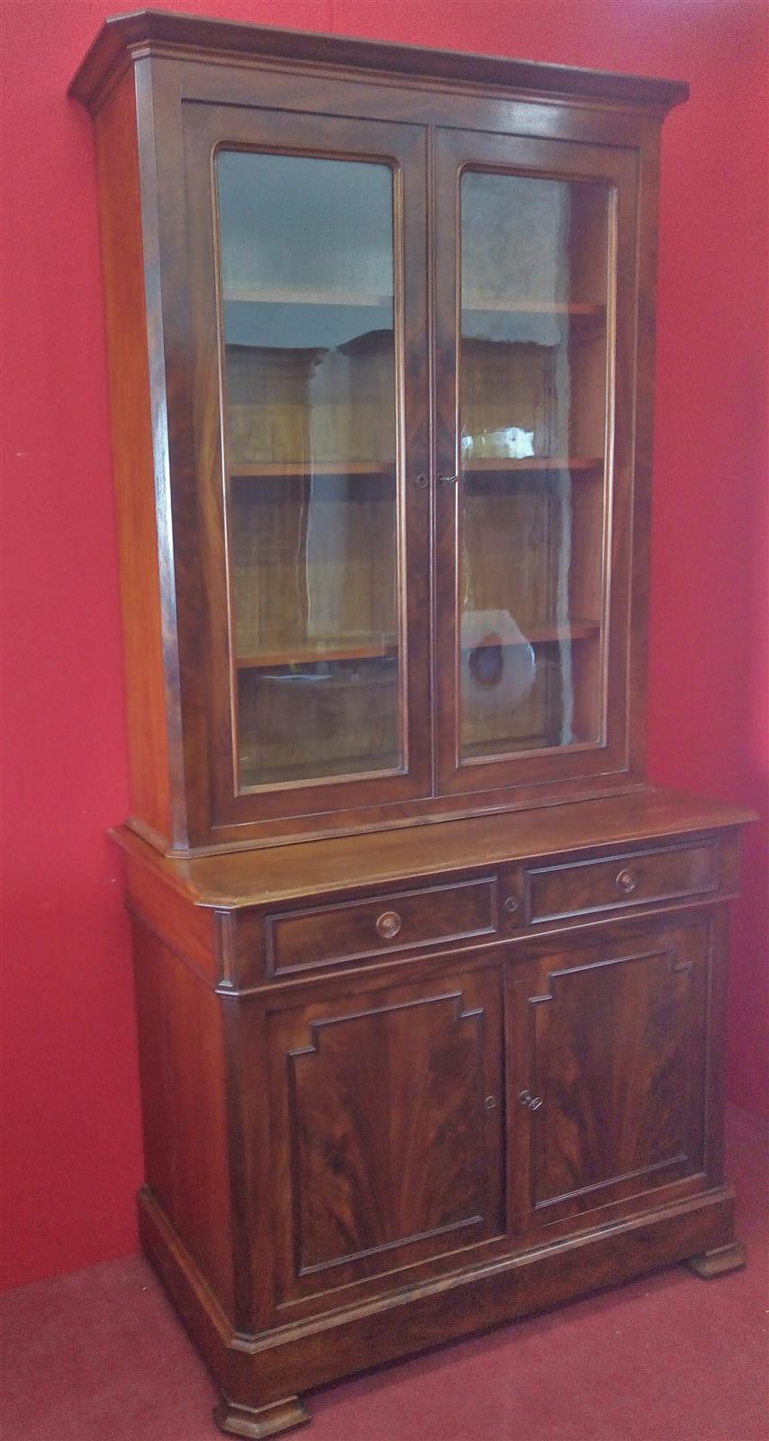 Small mahogany two-door bookcase