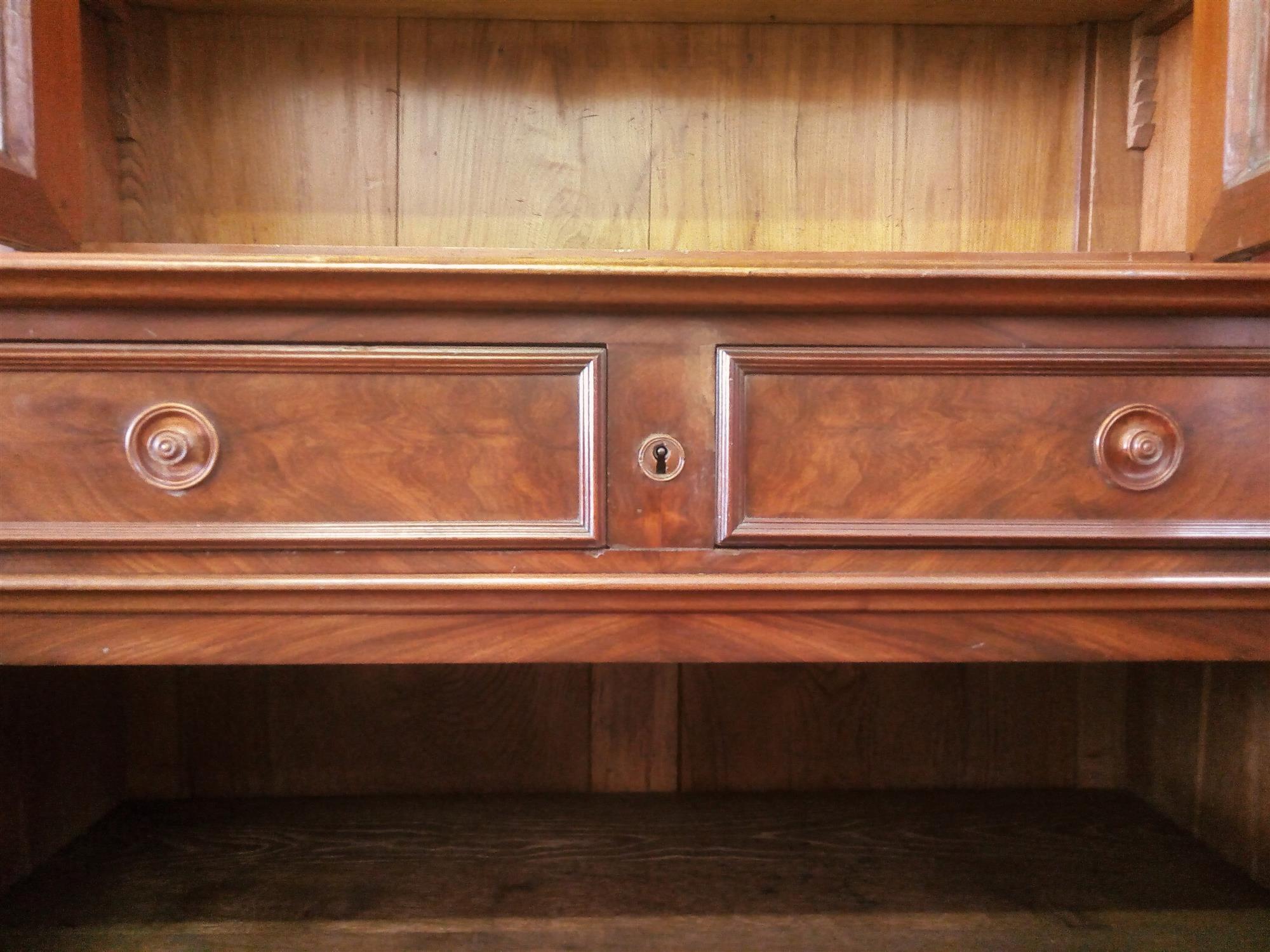 Small mahogany two-door bookcase