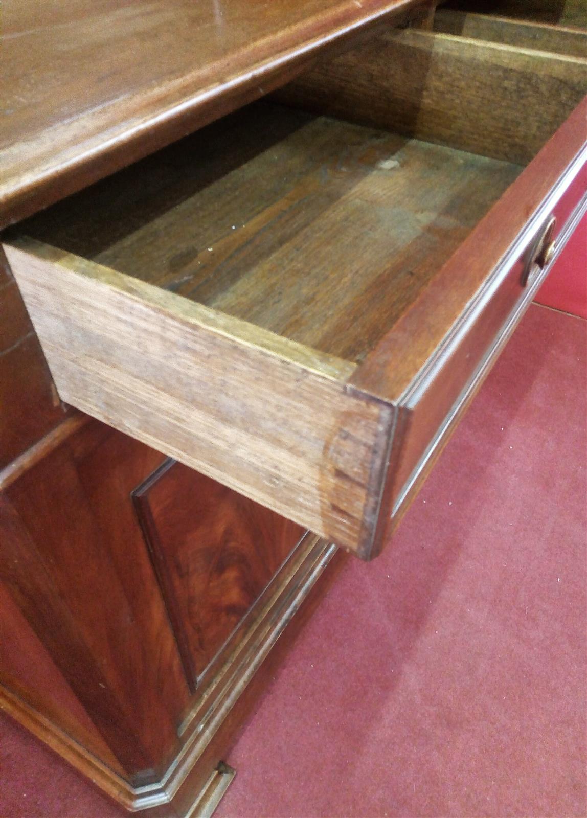 Small mahogany two-door bookcase