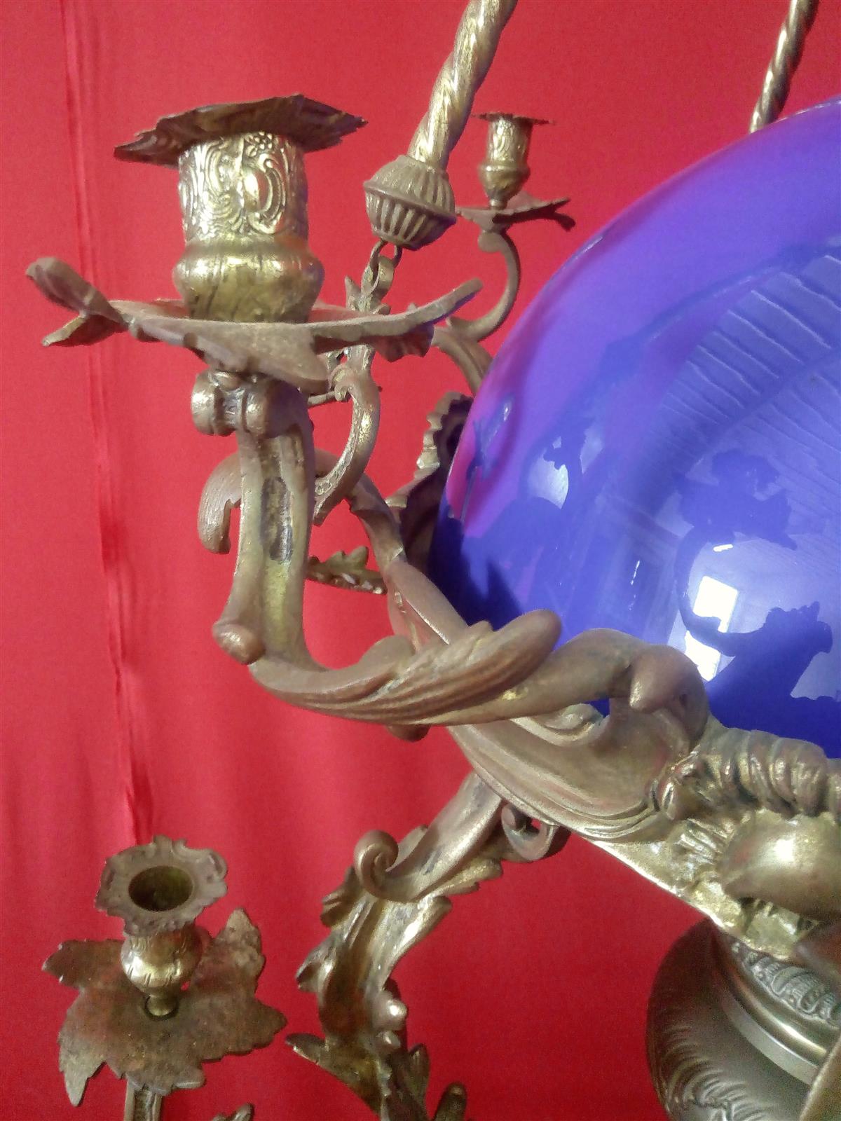 Bronze chandelier with cobalt blue cup