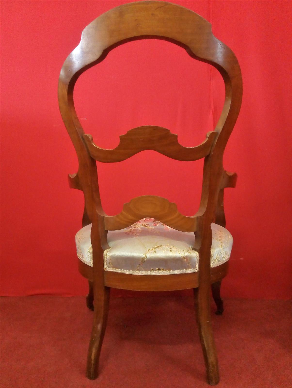 Pair of armchairs with open backrest