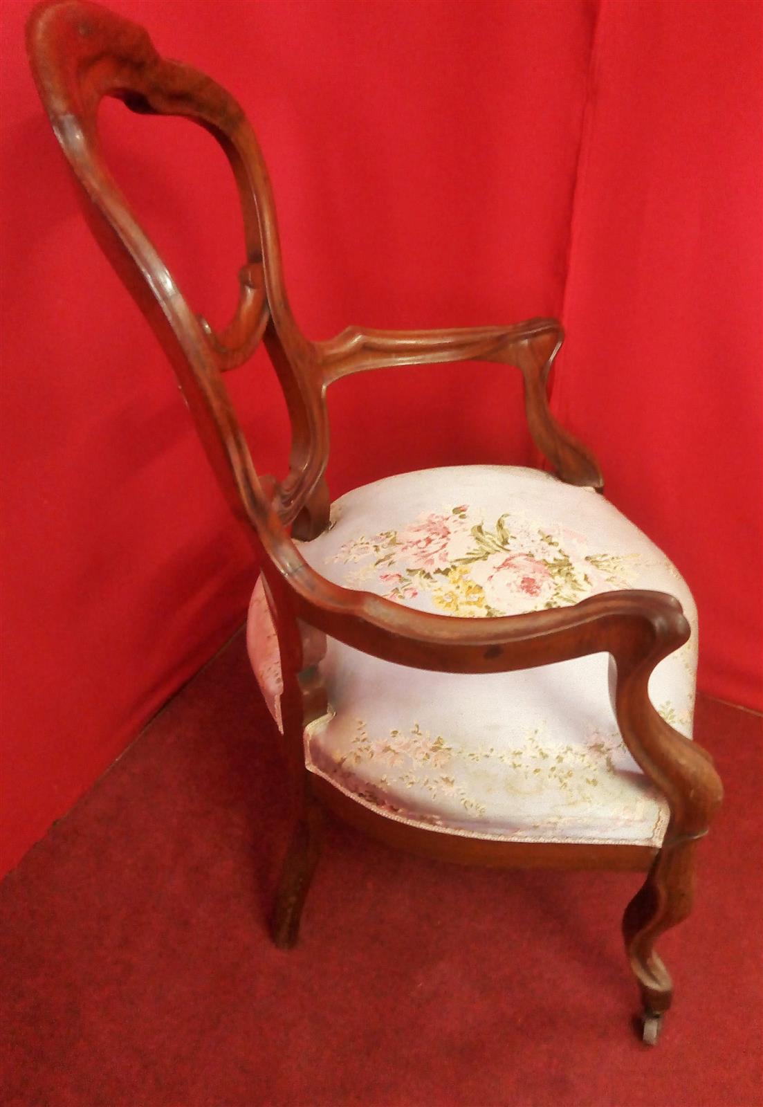 Pair of armchairs with open backrest