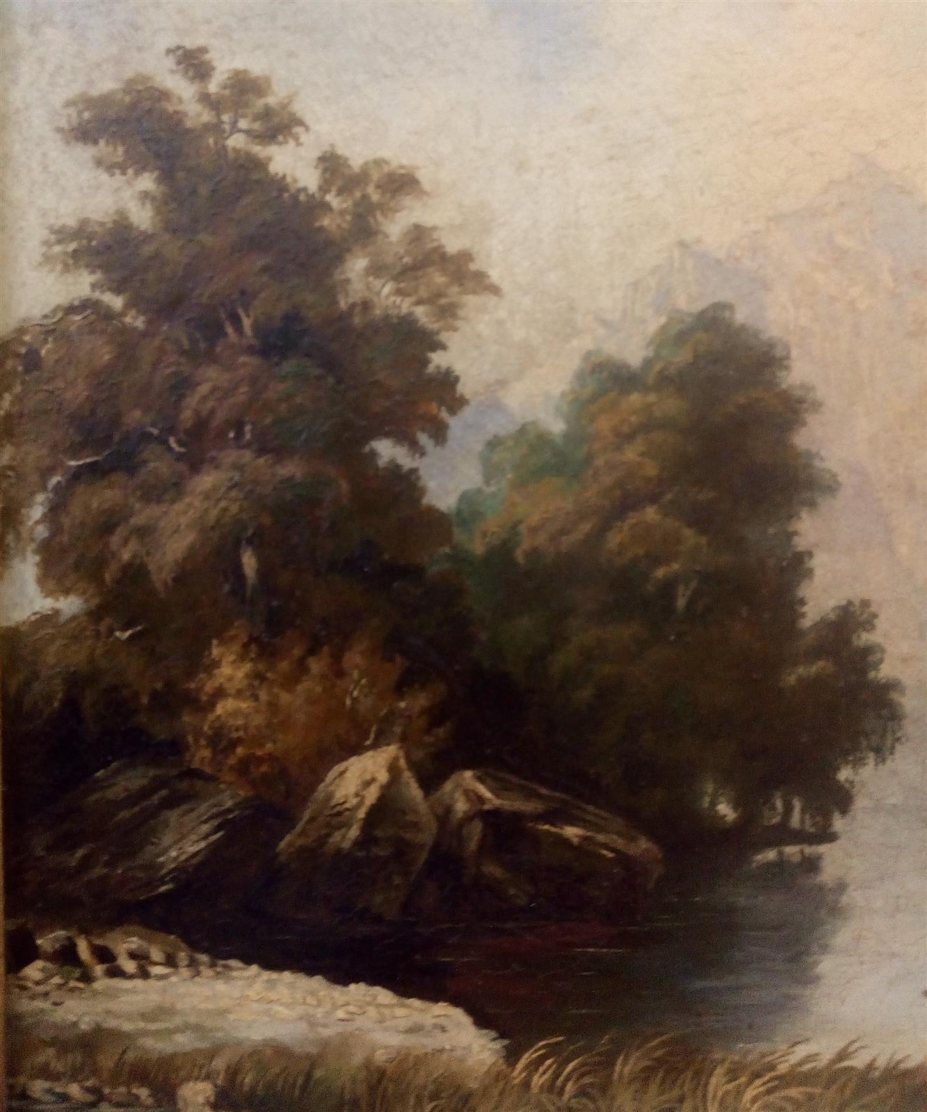 Oil painting of a landscape with a golden frame