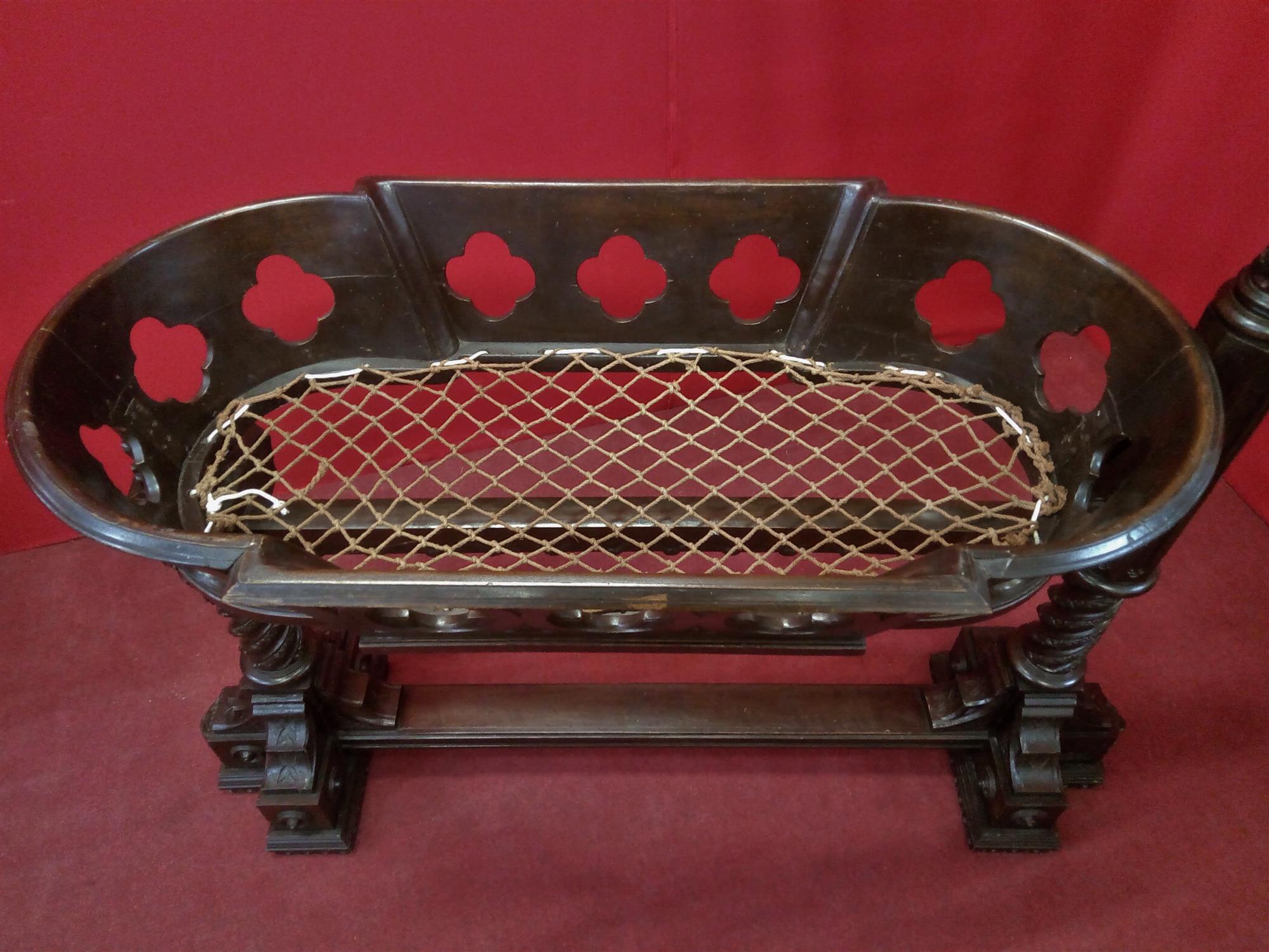 Carved baby cot