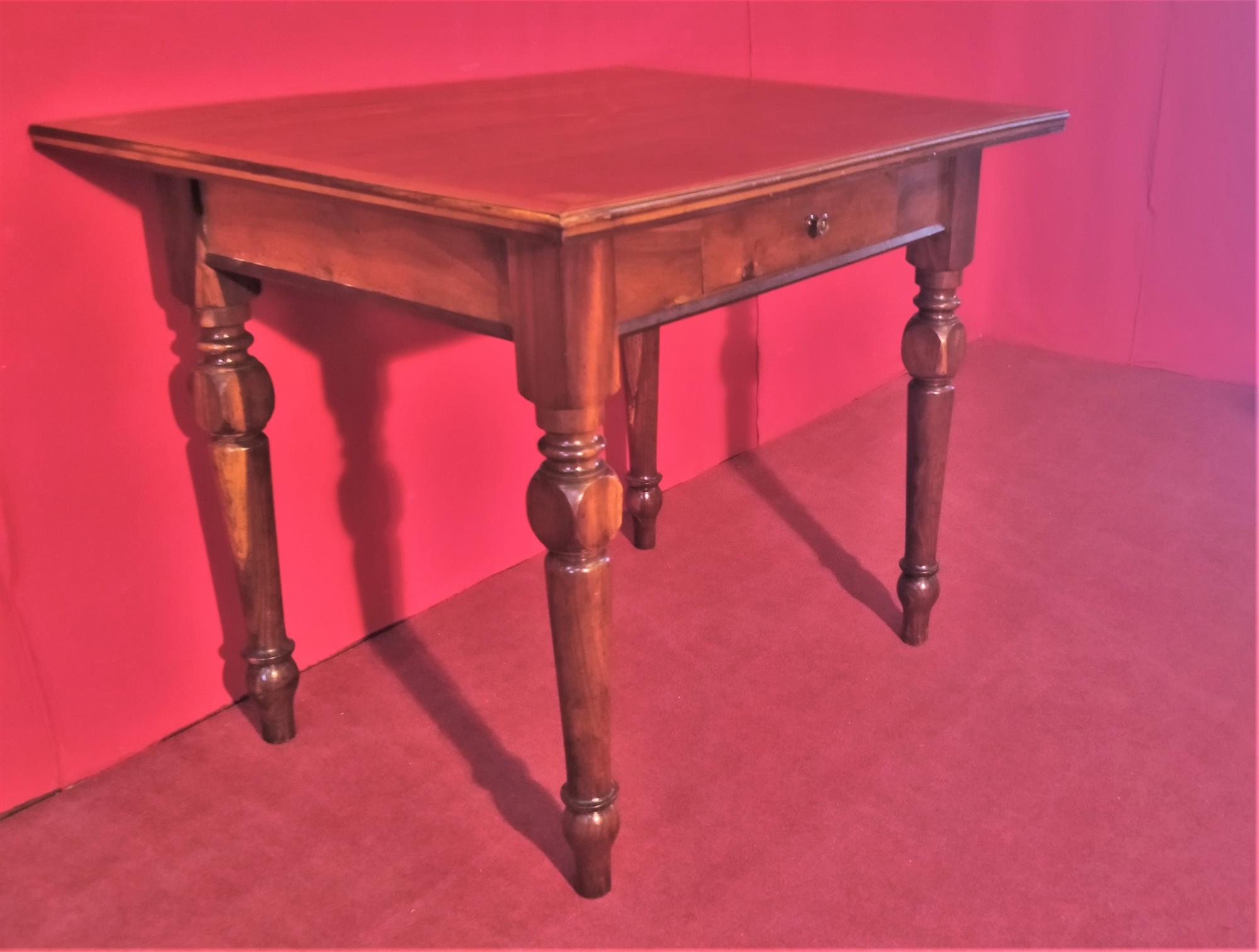 Coffee table with inlaid top and drawer