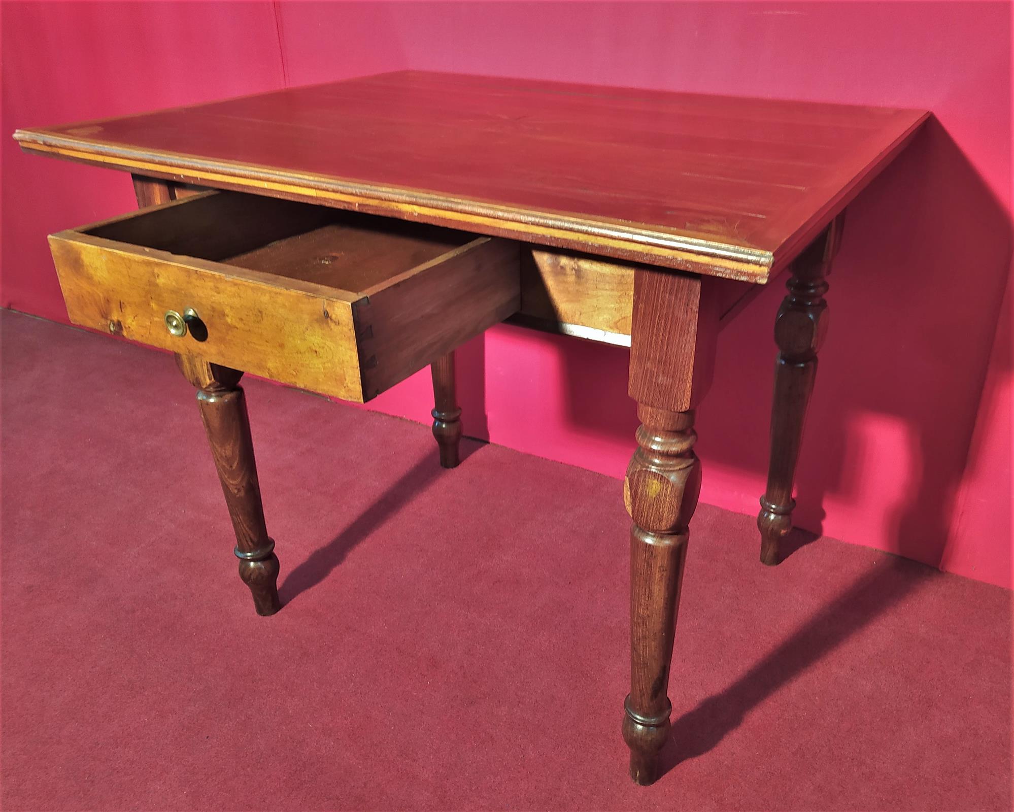 Coffee table with inlaid top and drawer