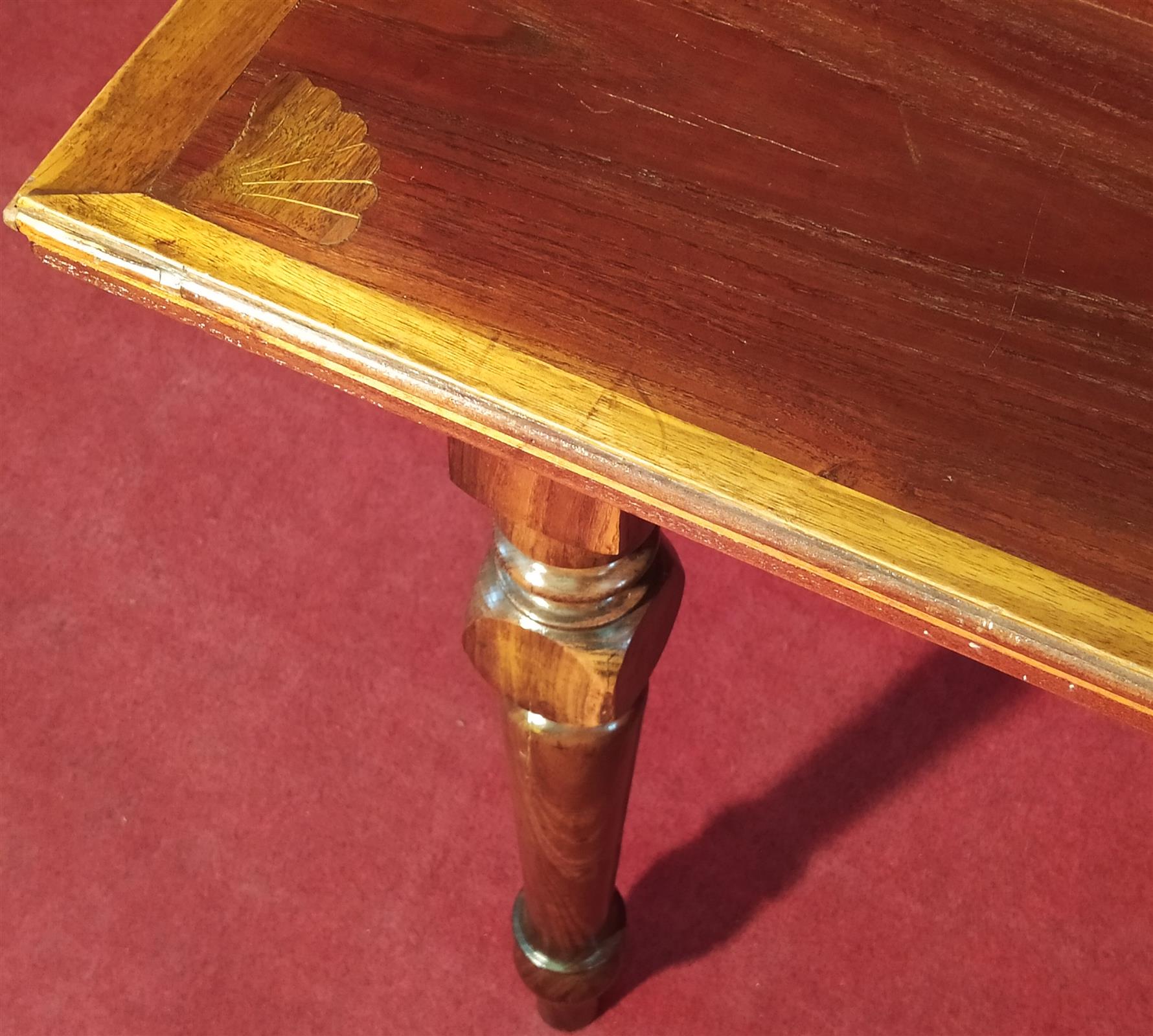 Coffee table with inlaid top and drawer