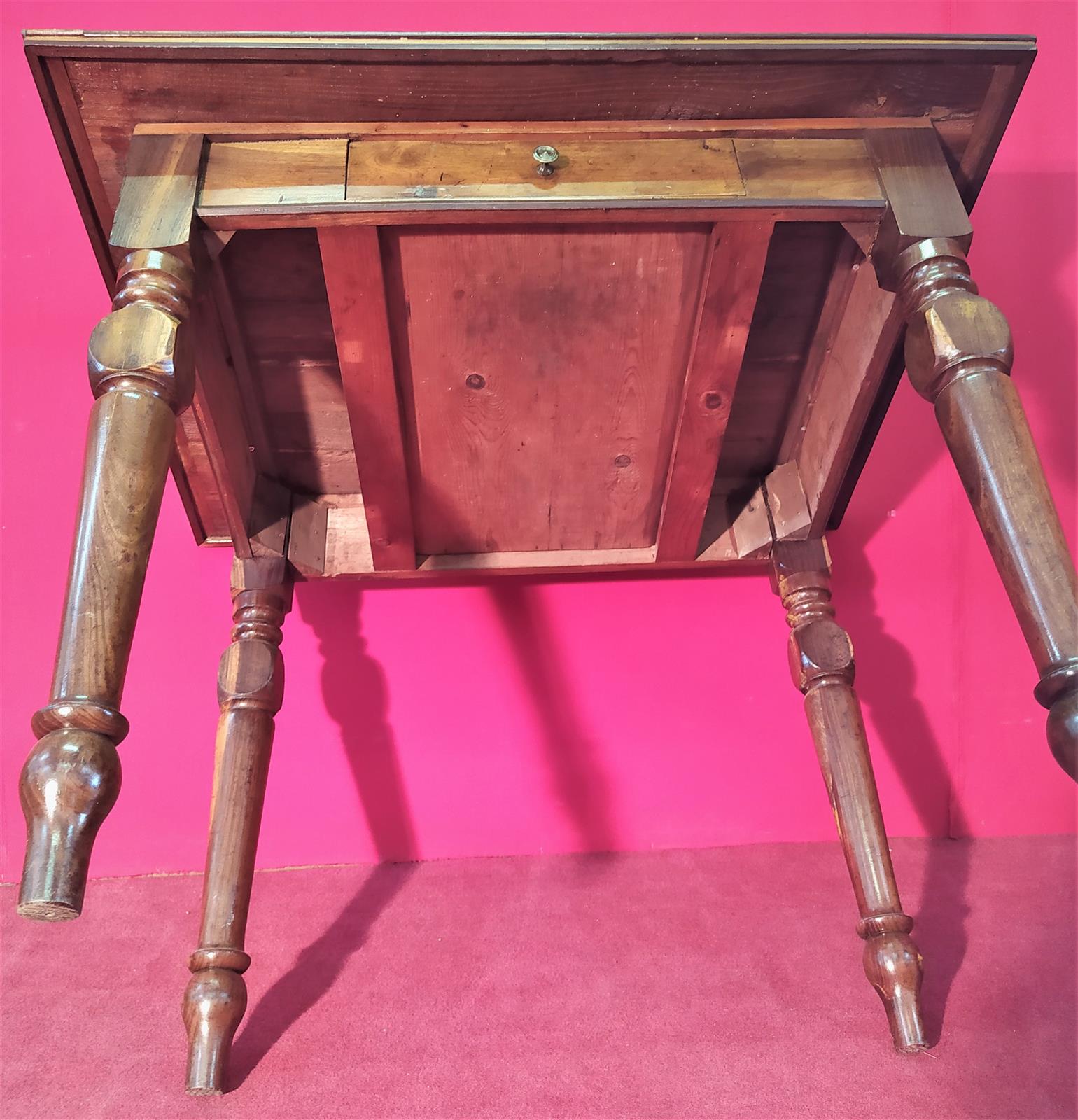 Coffee table with inlaid top and drawer