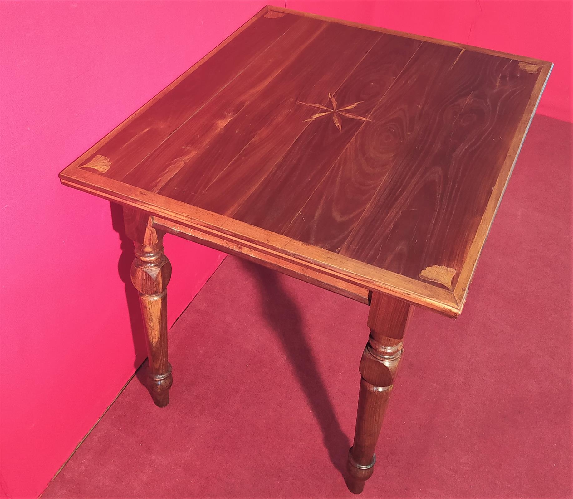 Coffee table with inlaid top and drawer