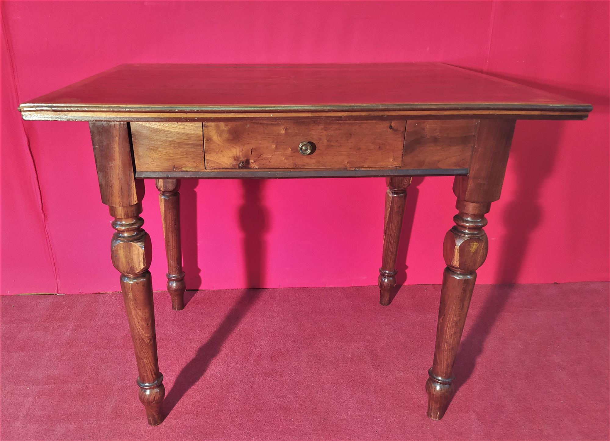 Coffee table with inlaid top and drawer