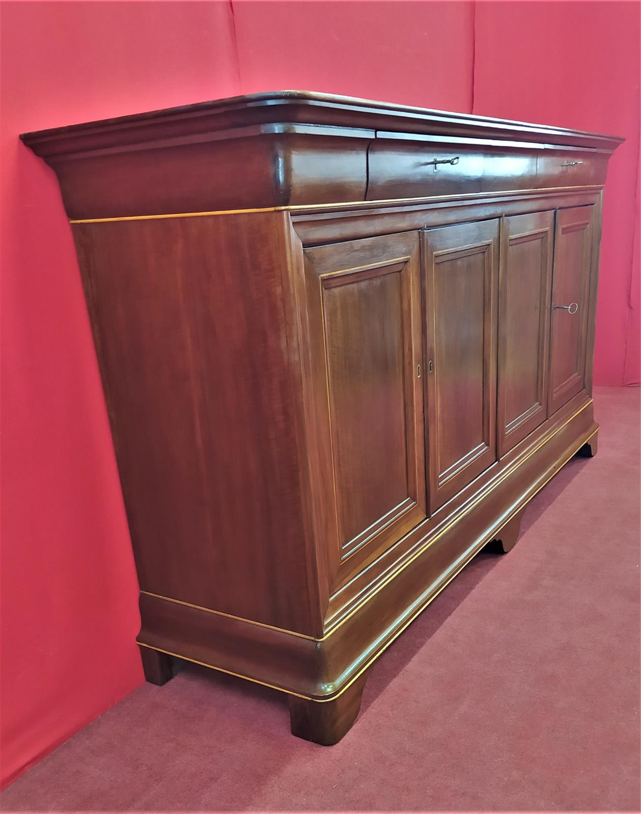 Narrow four door sideboard