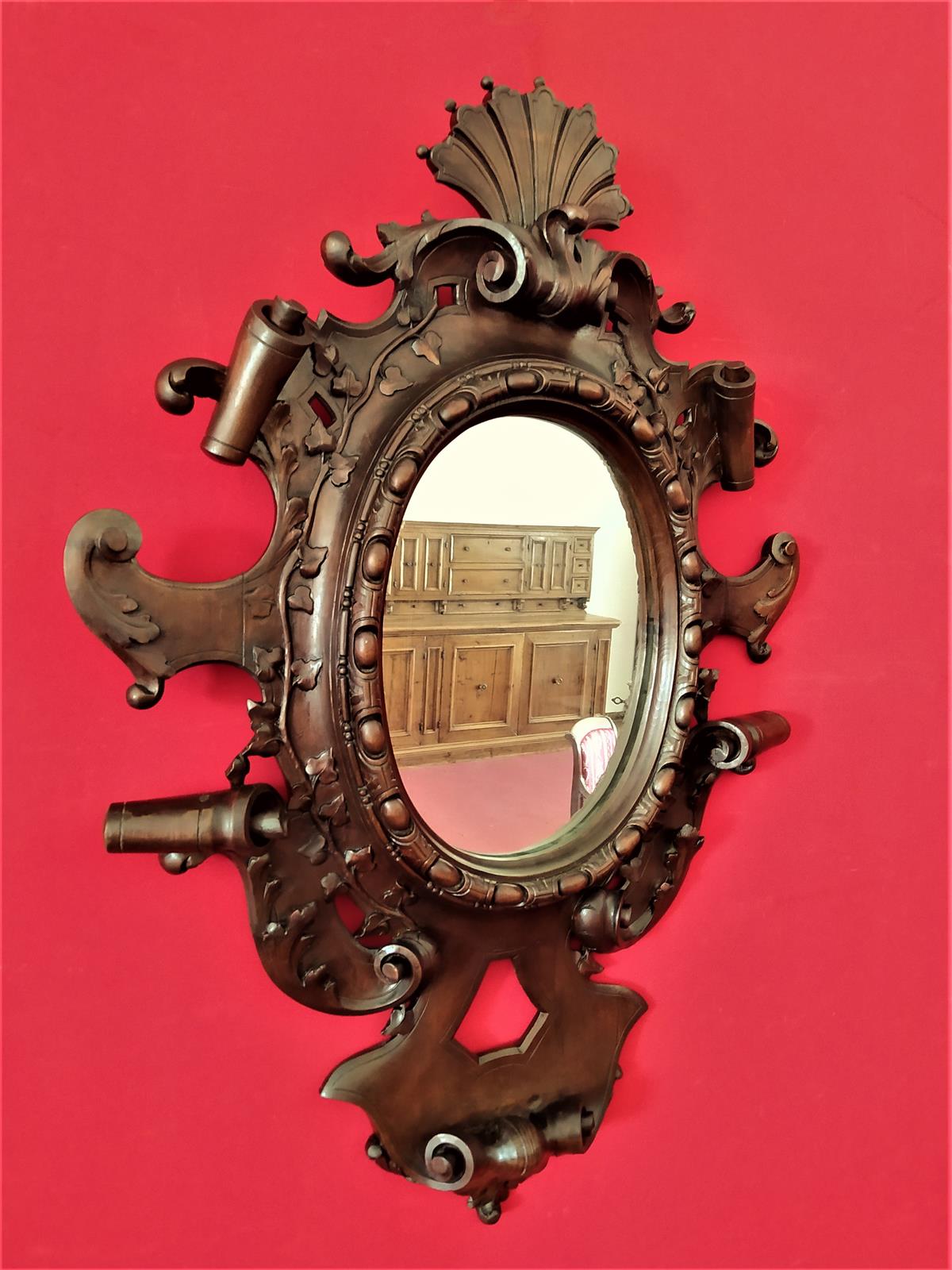 Mirror in carved wood