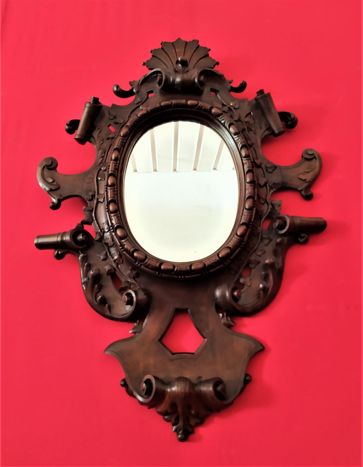 Mirror in carved wood