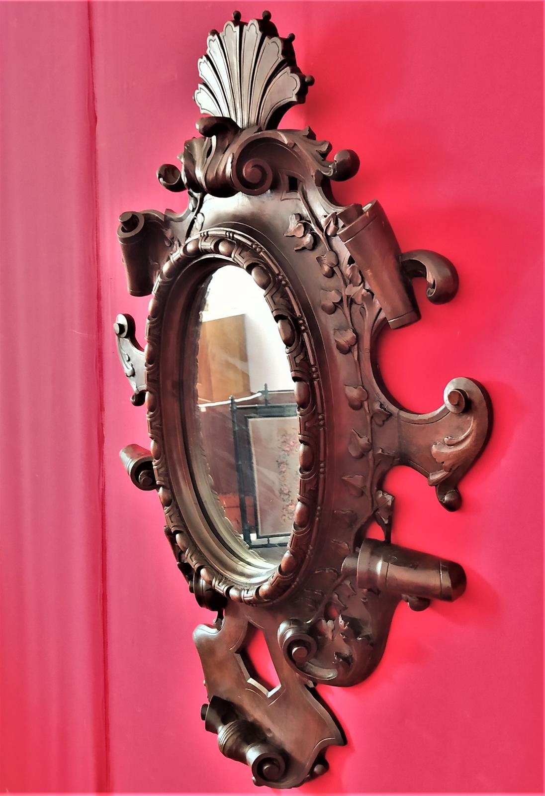 Mirror in carved wood