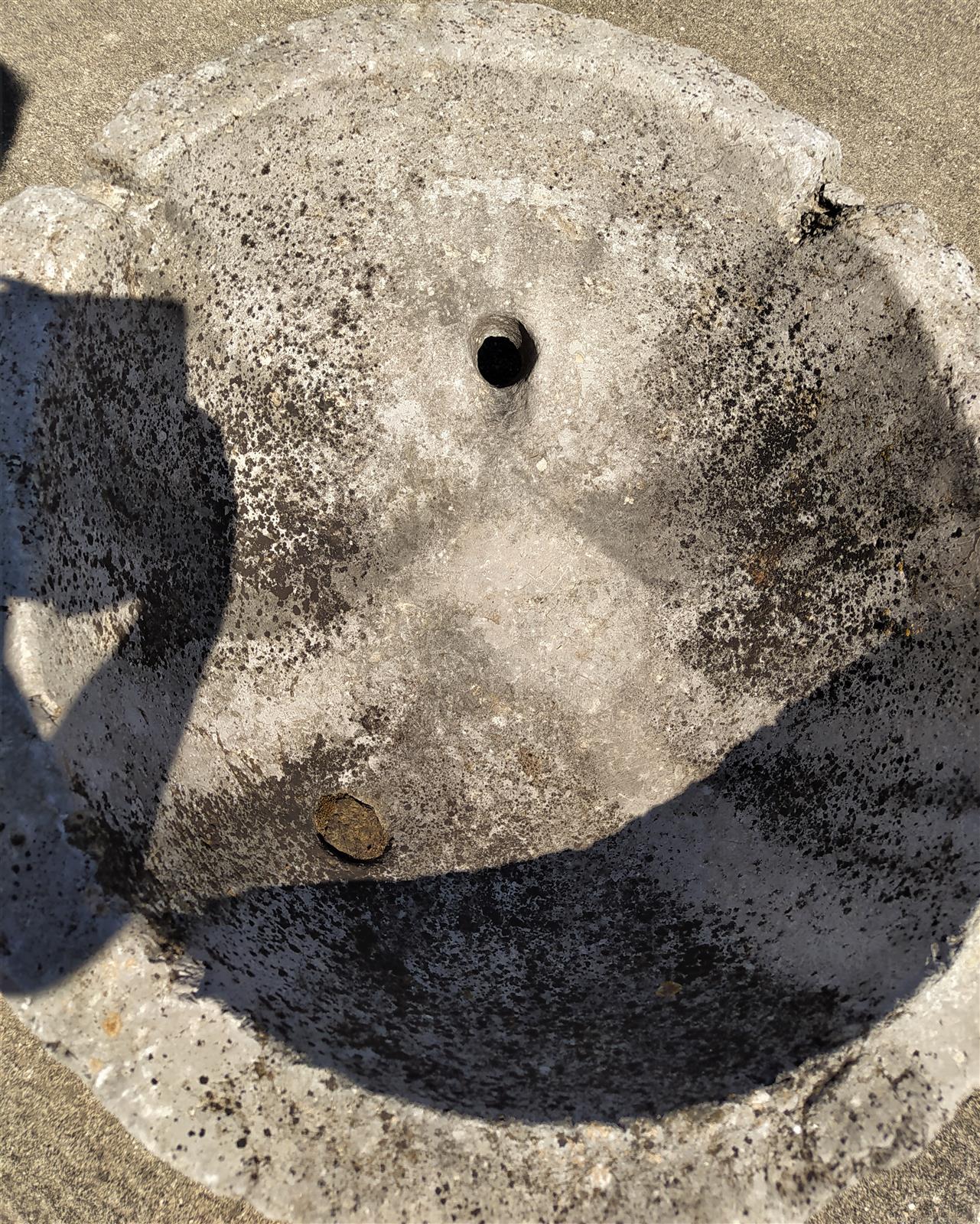 Holy water stoup in stone from the early 700s