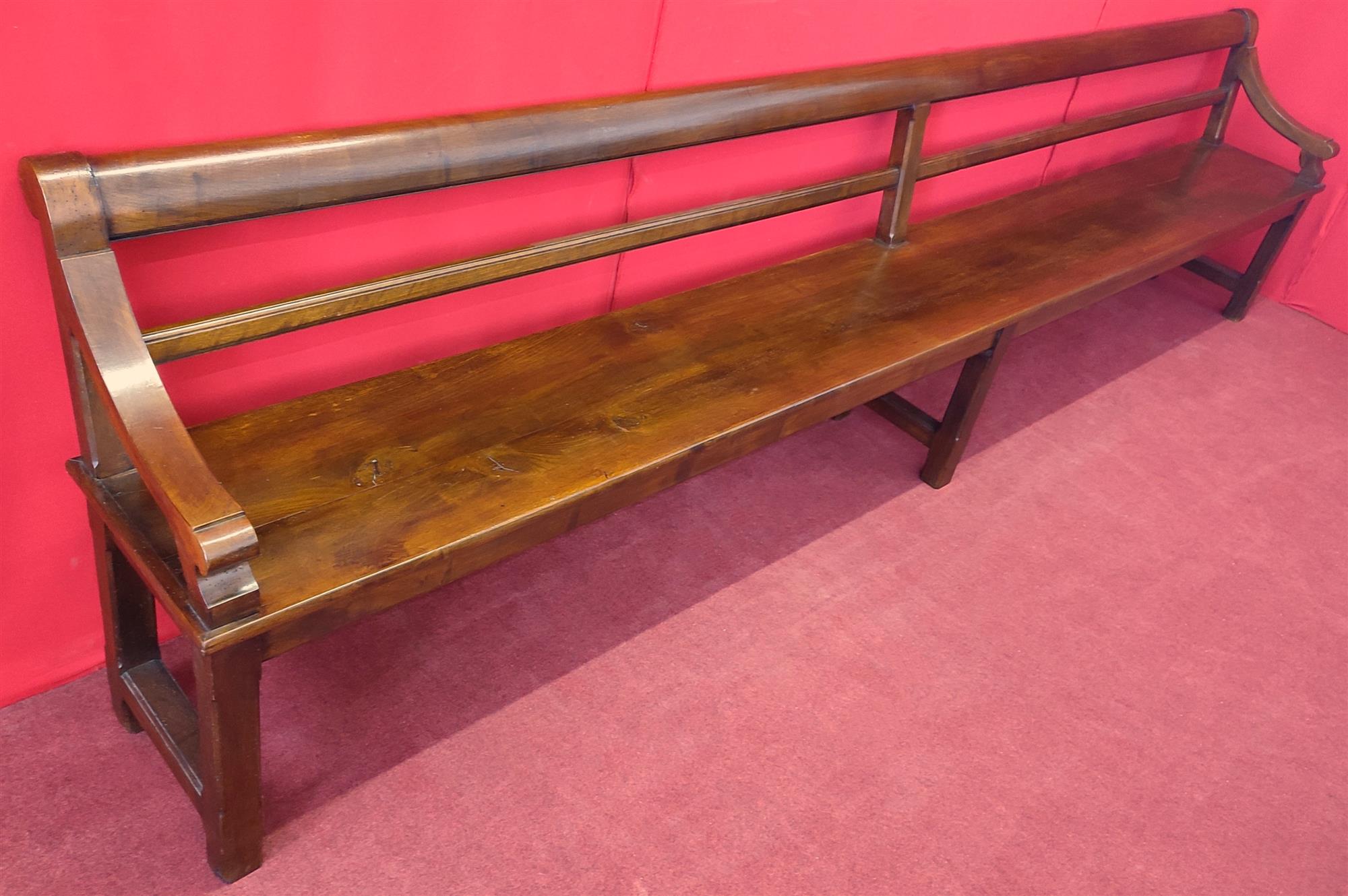Long bench with armrests