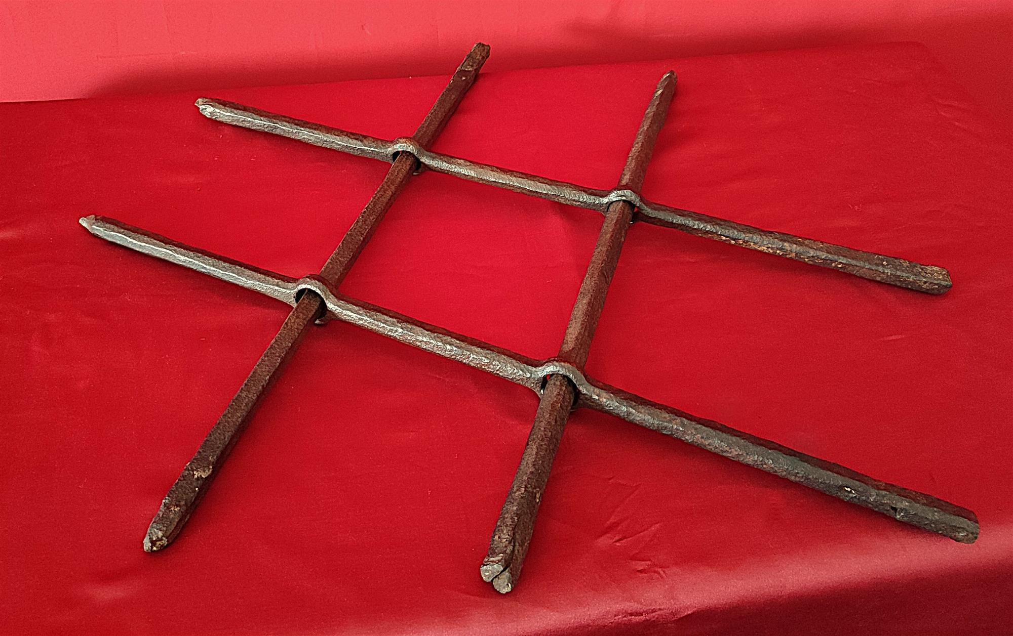 Grata ad incasso in ferro battuto
