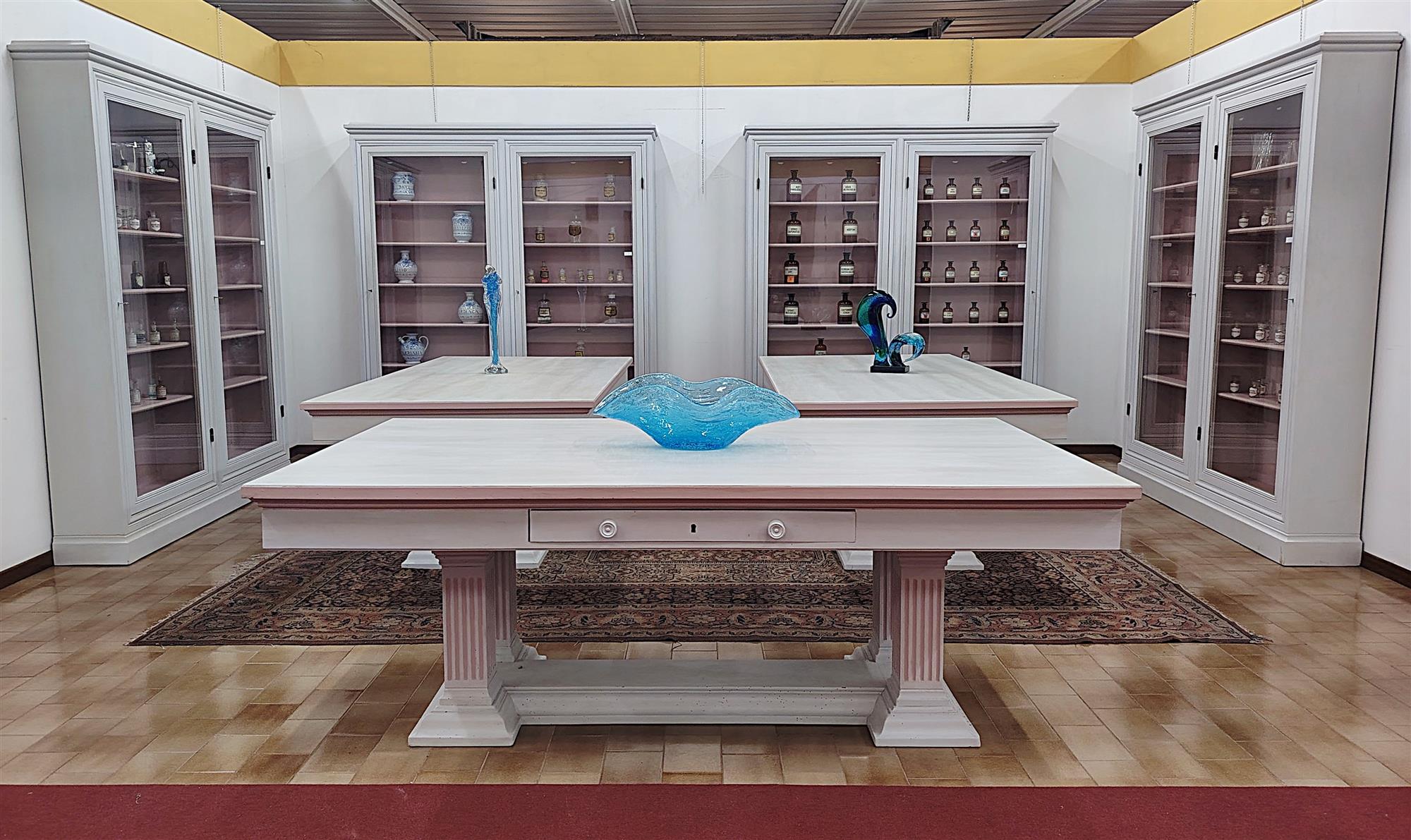 Group of bookcases with tables