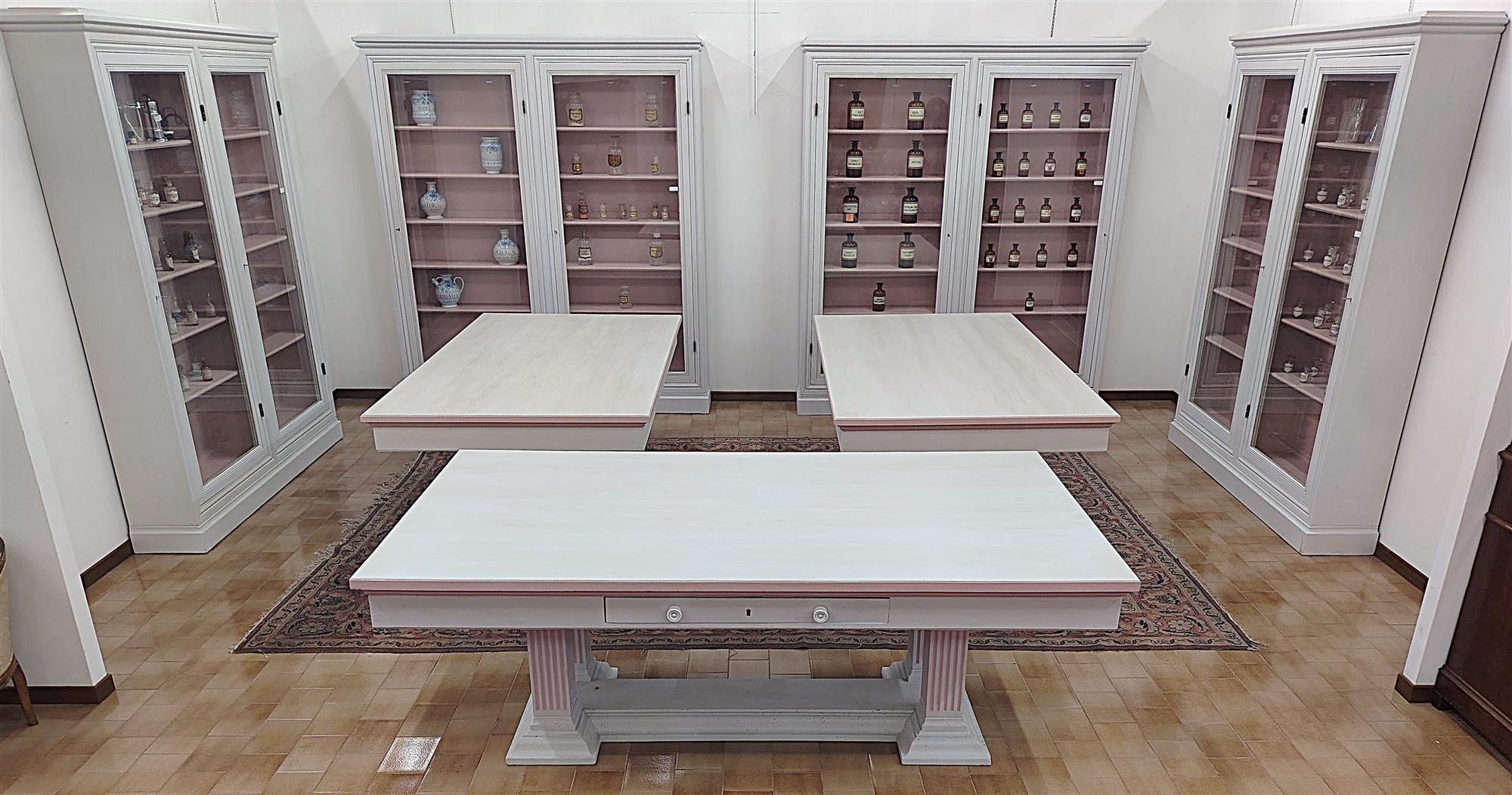 Group of bookcases with tables