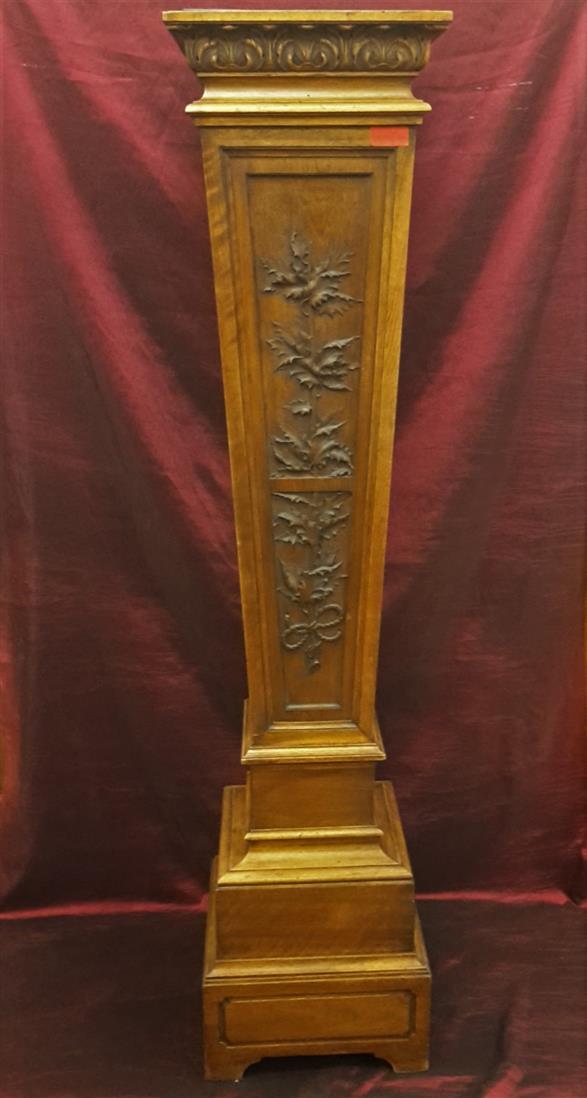 Carved walnut column